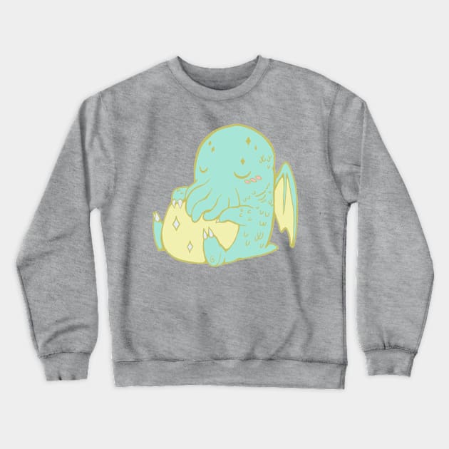 Baby Cthulhu Lies Dreaming Crewneck Sweatshirt by Khelekmir